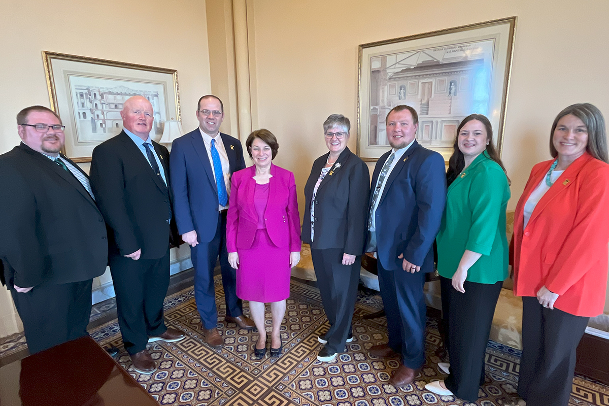 group of members with a legislator